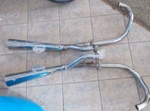 1980-81 Suzuki GS850GL OEM#14305 & 14306-45310-H01 Exhaust Muffler Pipes (ex/rm). Fixed Price $200.00.